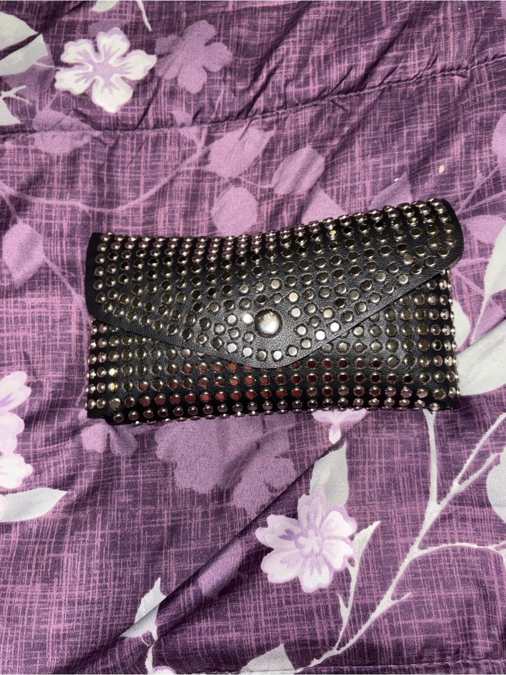 Black Studded Envelope Clutch comes with a detachable strap